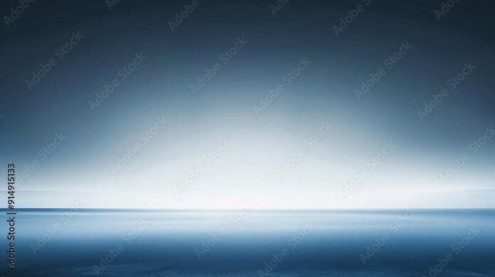 A tranquil, minimalist landscape with a hazy, blue sky and a calm ocean. A tranquil, minimalist landscape with a hazy, blue sky and a calm ocean.