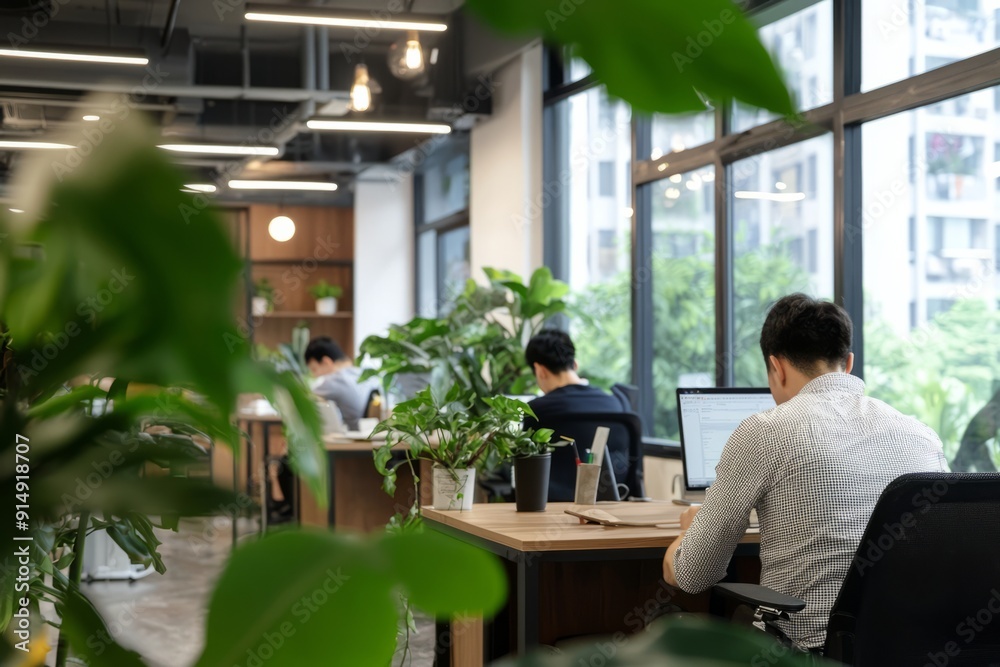 A startup office with a casual dress code and team members working on innovative projects, Generative AI A startup office with a casual dress code and team members working on innovative projects, Generative AI
