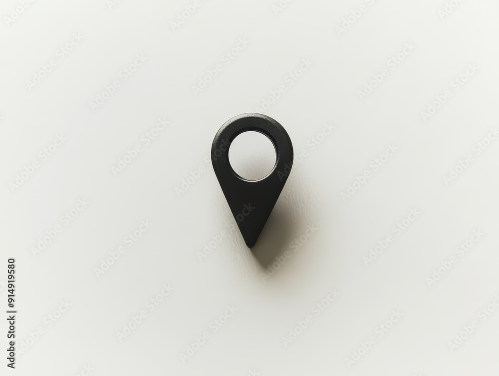 Minimalist black location pin icon on a light background, symbolizing navigation and mapping. Minimalist black location pin icon on a light background, symbolizing navigation and mapping.