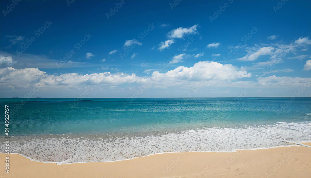 広い海と砂浜。青空。The wide sea and the sandy beach. Blue sky.