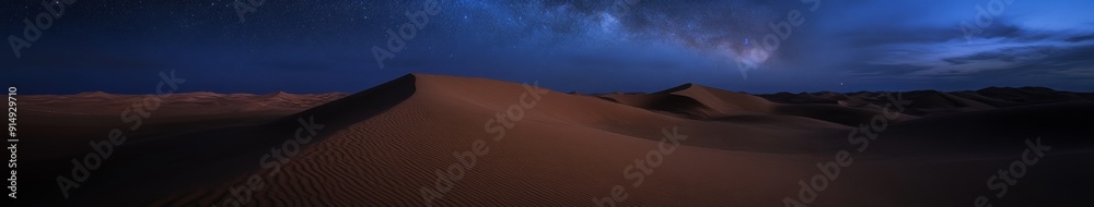 Fototapeta premium Majestic Milky Way Over Vast Desert Dunes: Starry Night Sky Illuminates Pristine Landscape. Cosmic Solitude Captured in Wide-Angle, Long Exposure Astrophotography. Ethereal Moonlit Scene for Nature, S