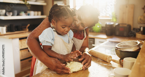 Bild auf Leinwand Black woman, child and teaching with dough, cooking and nutrition for support, love and education