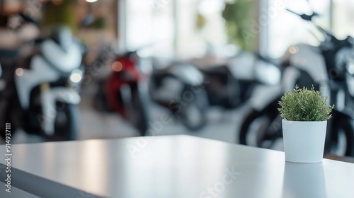 White table with blurred row of motorcycles in the background