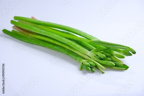 Green leaves and bouquet of yellow burhead or (limnocharis flava (l.) buchenau) isolate on white background. photo