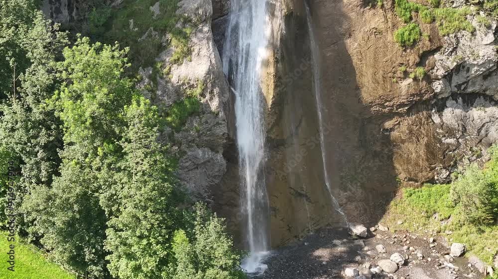 Static image of water crashing against rocks at the base of Klöntal Waterfall in Switzerland. Static image of water crashing against rocks at the base of Klöntal Waterfall in Switzerland.