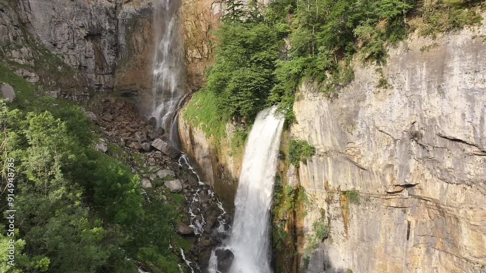 Splendid Seerenbachfälle cascading water forcefully over the rocks of the Swiss Alps. Splendid Seerenbachfälle cascading water forcefully over the rocks of the Swiss Alps.