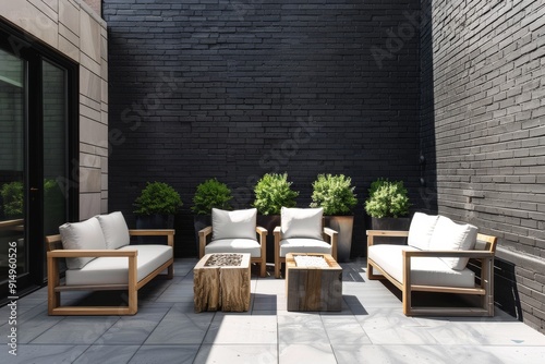 Contemporary Rooftop Patio with Chic Furniture and Greenery photo