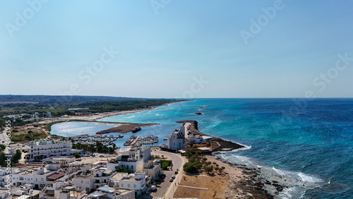 Fototapeta Naklejka Na Ścianę i Meble -  Torre San Giovanni is renowned for its long white beaches of incredible beauty and quality combined with a particularly light blue and transparent sea with shallow waters for very long stretches