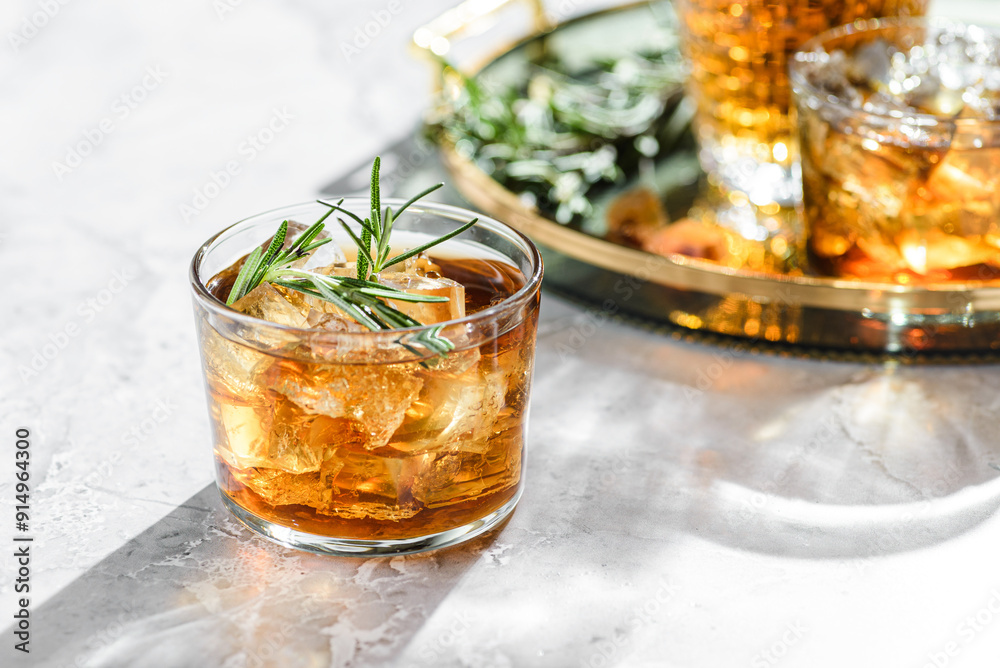 two glasses of whiskey on a tray two glasses of whiskey on a tray