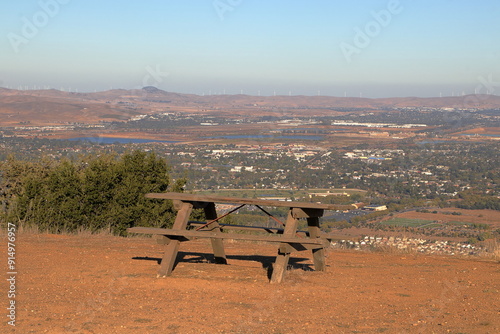 Picnic tables with a view of the East Bay hills and valleys in Northern California photo