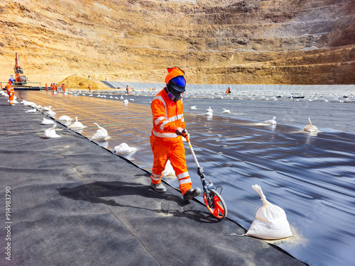 Installation process of geosynthetics in industry and mining photo