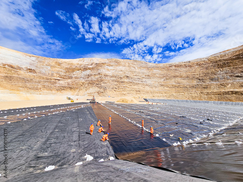 Installation process of geosynthetics in industry and mining photo