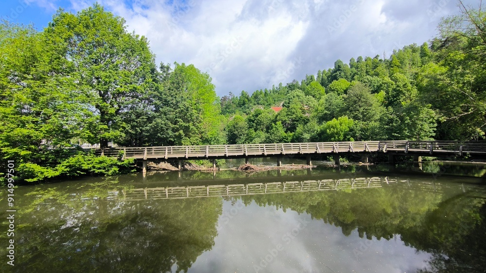 landscape by the Pivka river in spring in Postojna village, Slovenia landscape by the Pivka river in spring in Postojna village, Slovenia