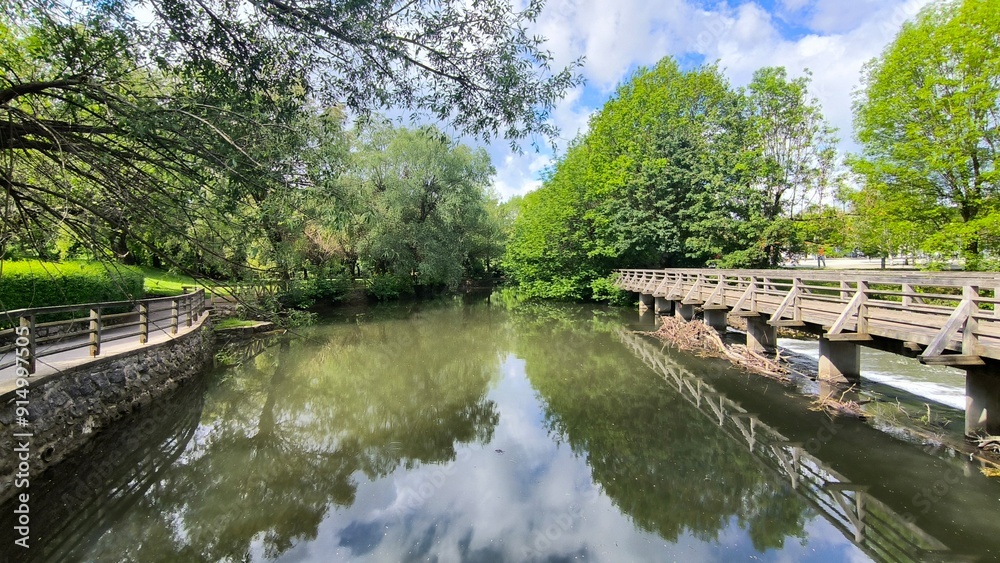 landscape by the Pivka river in spring in Postojna village, Slovenia landscape by the Pivka river in spring in Postojna village, Slovenia