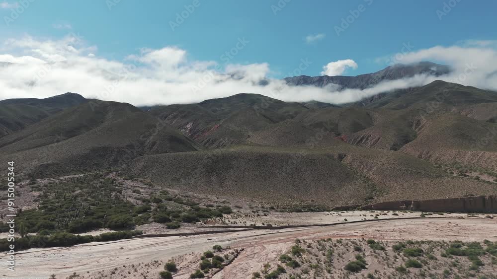 Beautiful cloudy mountains in the province of Jujuy forward drone flight in argentina in slow motion, copy space Beautiful cloudy mountains in the province of Jujuy forward drone flight in argentina in slow motion, copy space