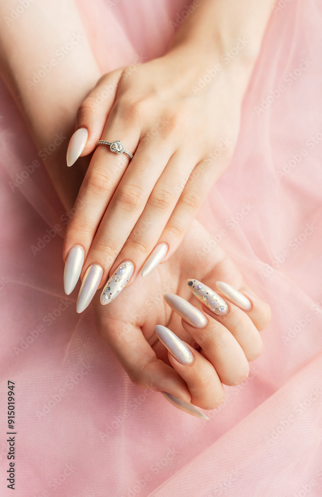 Female Hands with beautiful pearl manicure Female Hands with beautiful pearl manicure