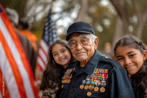 army veteran, at an outdoor ceremony with his granddaughters hugging him, on Veteran's Day.