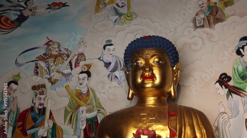 Closeup of Buddha statue in Daci monastery in Chengdu, Sichuan photo