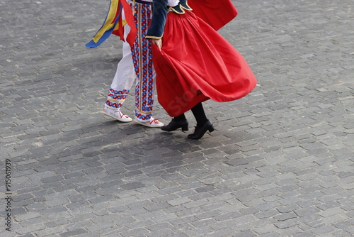 Basque folk dance couple exhibition in an outdoor festival