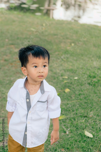 Portrait of Happy Asian boy in the park