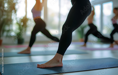 Yoga Class Close-Up of Women in Black Yoga Pants and Tops