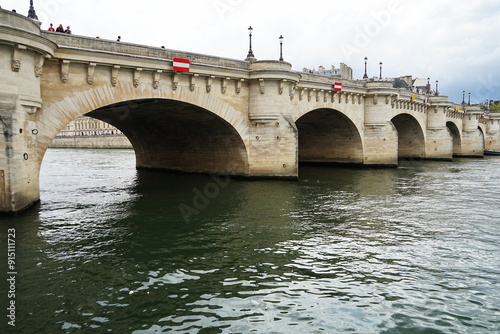 Palace of Justice along the Seine River in Paris, France photo