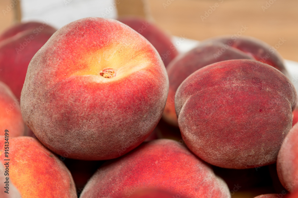 Ripe and juicy peaches in a box Ripe and juicy peaches in a box