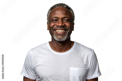 Portrait of a middle-aged African man with a warm smile, wearing a plain white t-shirt, standing with his hands in his pockets photo