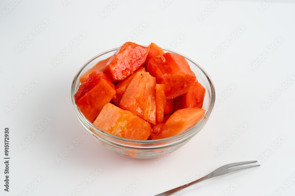 papaya slices in clear bowl isolated white background. Perfect for design element, product packaging, promotion, or any commercial purposes. papaya slices in clear bowl isolated white background. Perfect for design element, product packaging, promotion, or any commercial purposes.