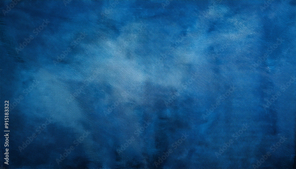 Obraz premium Textured Blue Velvet Curtain Draped in Gentle Light, Elegant Backdrop with Subtle Folds and Rich Fabric Details