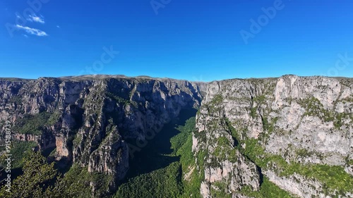 Profile view of mountain range National Park of Tzoumerka, Peristeri and Arachthos Gorge in Greece during morning. photo