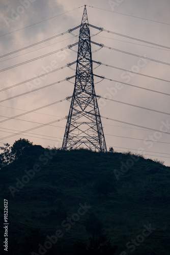 Transmission Power Tower with High Tension Wires on Hilltop, Himachal Pradesh photo