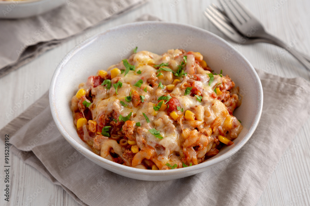 Homemade One-Pot Cheesy Taco Pasta in a Bowl, side view. Homemade One-Pot Cheesy Taco Pasta in a Bowl, side view.