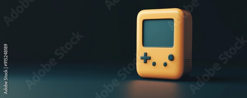 Yellow handheld video game console isolated on black background. photo