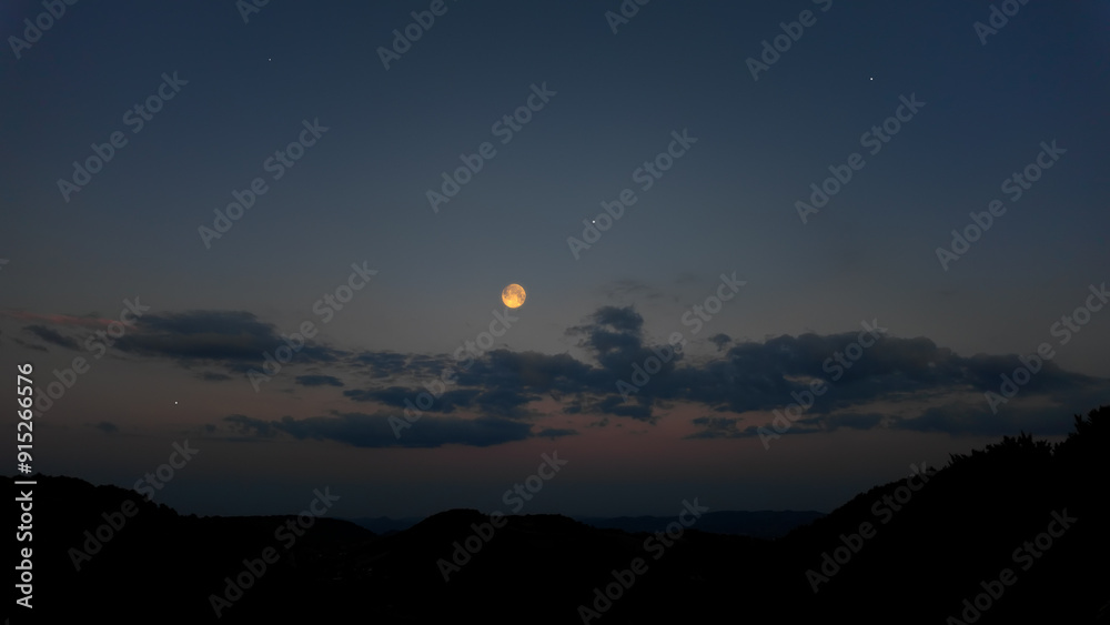 Fototapeta premium Full Moon, stars and landscape scenery silhouettes.