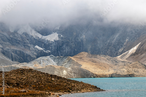 Beautiful mountain scenery. River, valley, snow, blue sky, white clouds. In-depth trip on the Sonamarg Hill Trek in Jammu and Kashmir, India photo