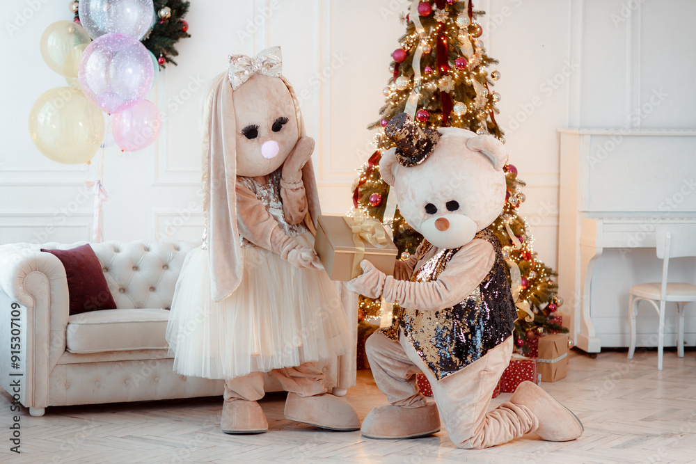 Happy new year 2025. Background for Christmas and New Year holidays. The teddy bear and rabbit bring a present for the new year. Winter vacation. Happy new year 2025. Background for Christmas and New Year holidays. The teddy bear and rabbit bring a present for the new year. Winter vacation.