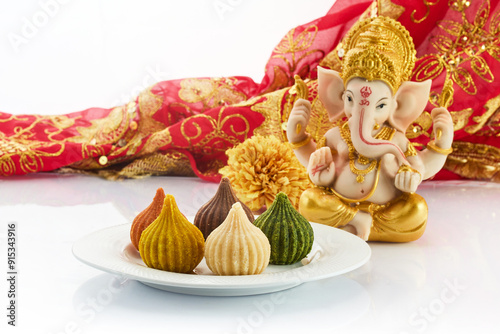 Ganesh Chaturthi Festival. Ganesh with Modaks photo