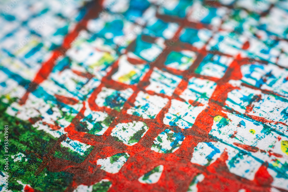 Extreme close up of colorful acrylic paint texture showing brush strokes. Selective focus.