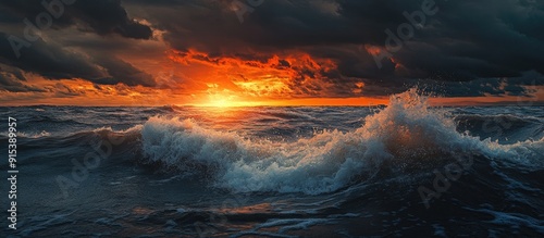 Baltic Sea beneath striking sunset clouds following a storm Waves and splashing water create an epic seascape Cyclone gale storm harsh weather meteorology ecology climate change natural occurrences photo