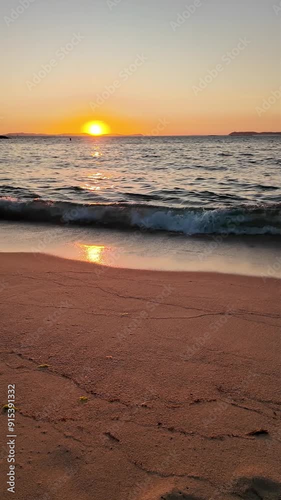 A stunning sunset graces the horizon, casting a warm glow over the ocean waves gently lapping the sandy shore, evoking peace, tranquility, and the beauty of nature's end-of-day spectacle. A stunning sunset graces the horizon, casting a warm glow over the ocean waves gently lapping the sandy shore, evoking peace, tranquility, and the beauty of nature's end-of-day spectacle.