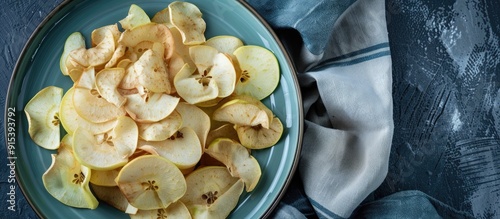 Healthy apple chips on a ro...
