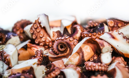 Obraz na płótnie Seafood. Pieces of fresh octopus for cooking w salonie