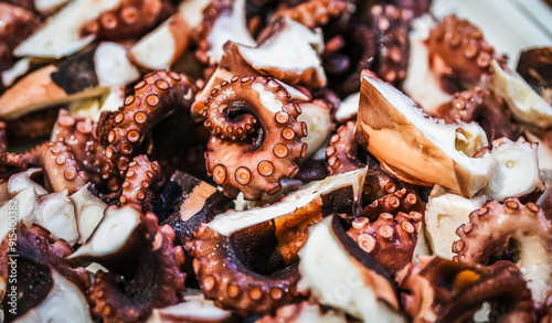 Obraz na płótnie Seafood. Pieces of fresh octopus for cooking w salonie