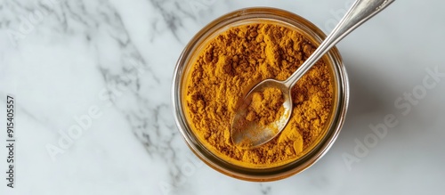 Curry powder in a glass wit...