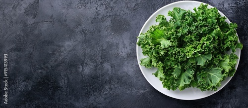 Green kale leaves on a plate Background for healthy clean eating Copy space photo