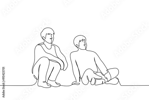 men sitting on the floor looking in one direction - one line art vector. concept male friends watching tv together or students on the grass