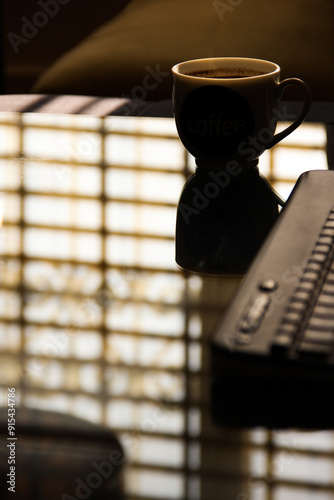 When a cup of coffee and a computer keyboard come together seemingly a freelancer is freelancing and working from home. Remote jobs are in demand nowadays.