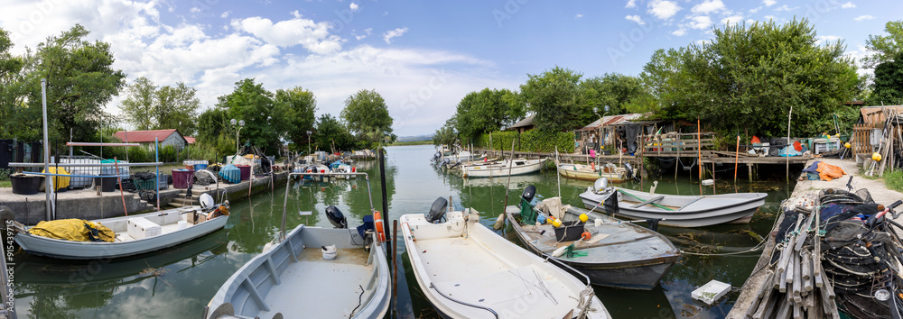 panoramic view of small harbor with fishing boats in Grado - Villagio Punta Sdobba in Italy