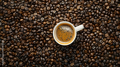 Espresso coffee mug over roasted coffee beans background